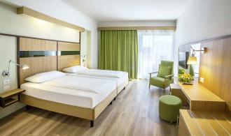 Apulia Single with Child Double Room Superior Schlafzimmer
